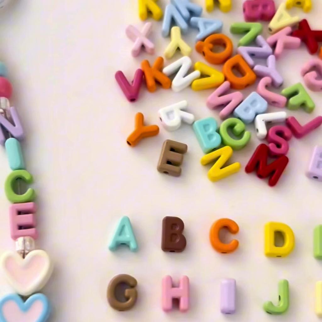 Kleine Legierung Tropföl Buchstabenperlen Alphabet Charms für DIY Armbänder 5 Stück
